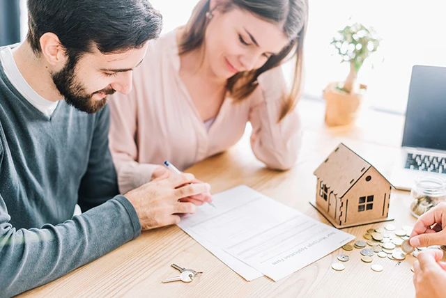 couples signing for personal loan